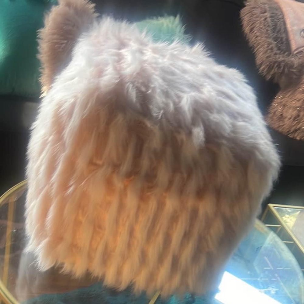 Faux fur ottomans (2)